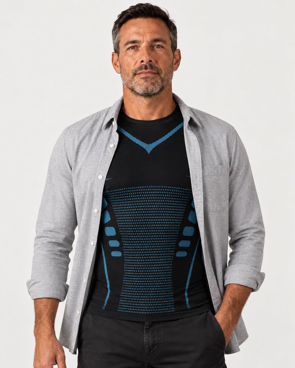Man wearing the HyroxFit compression layer under an open grey shirt